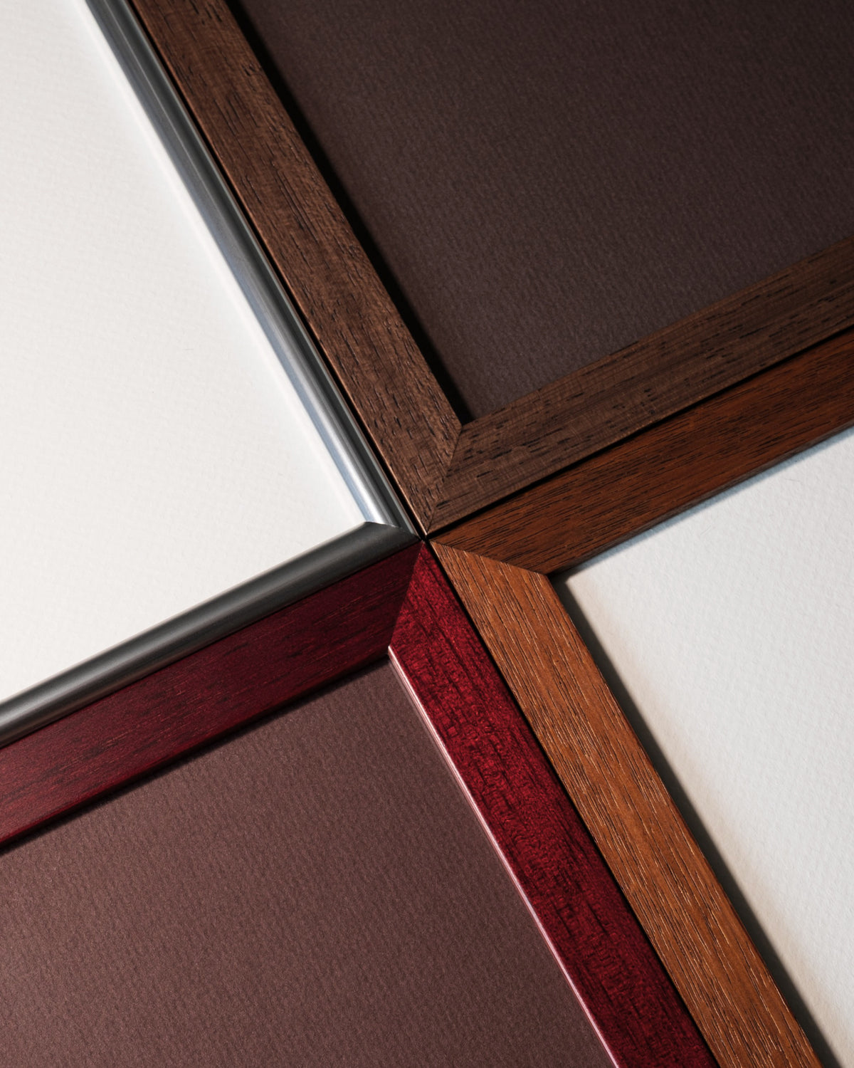 Corners of the four Visions finishes: Chrome, Walnut, Teak and Merlot